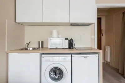 Cuisine ou kitchenette dans l'établissement Appartement Lyon Gerland - Enjoy in Lyon