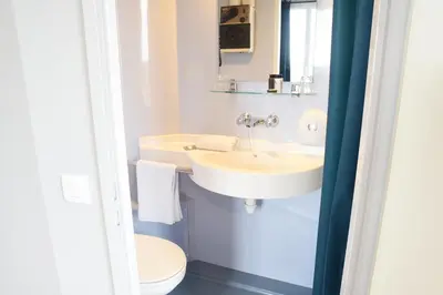 Salle de bains dans l'établissement Domaine de Sainte-Croix