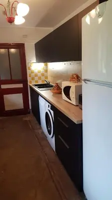 Cuisine ou kitchenette dans l'établissement Le moulin de Varax