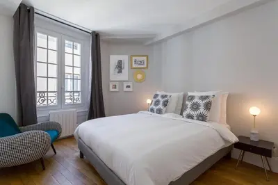 Un ou plusieurs lits dans un hébergement de l'établissement Strada - Furnished apartment - Downtown Lyon