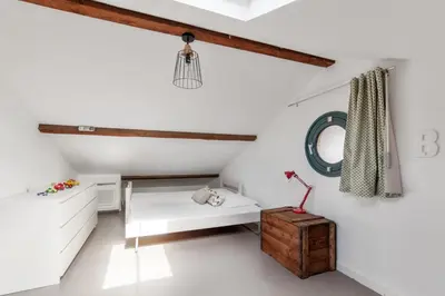 Un ou plusieurs lits dans un hébergement de l'établissement Maison Emeraude - Welkeys