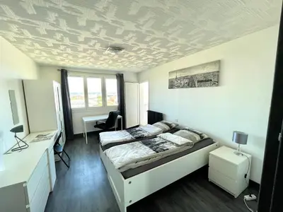 Un ou plusieurs lits dans un hébergement de l'établissement Belle chambre privée en colocation G