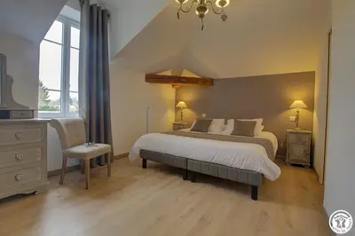 Un ou plusieurs lits dans un hébergement de l'établissement Villa La Maternite