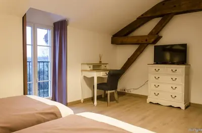 Un ou plusieurs lits dans un hébergement de l'établissement Villa La Maternite