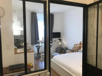 Un ou plusieurs lits dans un hébergement de l'établissement La Suite de Léon appartement D - Lyon Garibaldi
