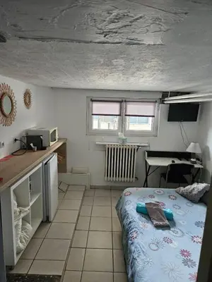 Cuisine ou kitchenette dans l'établissement Aux 2 lots