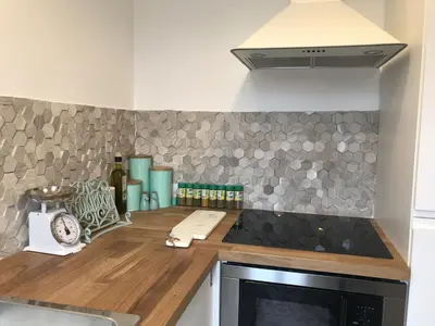 Cuisine ou kitchenette dans l'établissement Le Joyau de Jouhaux appartement G - Lyon Garibaldi