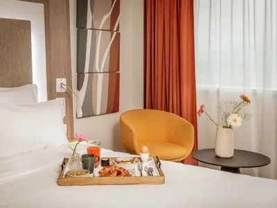 Un ou plusieurs lits dans un hébergement de l'établissement Novotel Lyon Centre-Confluence Bord de Saone
