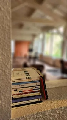 Un ou plusieurs lits dans un hébergement de l'établissement Logis Hôtel La Cascade - Lyon Nord
