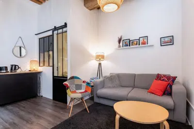 Coin salon dans l'établissement Le 14 Sathonay