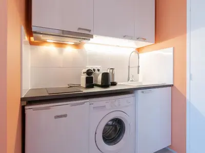Cuisine ou kitchenette dans l'établissement Macé Studio Apartment