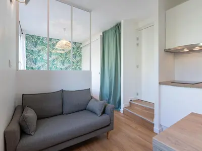 Coin salon dans l'établissement Appartements Le Berliet - Montplaisir