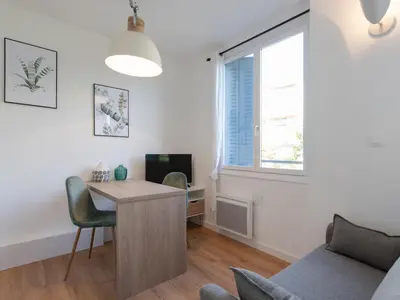 Télévision ou salle de divertissement dans l'établissement Appartements Le Berliet - Montplaisir