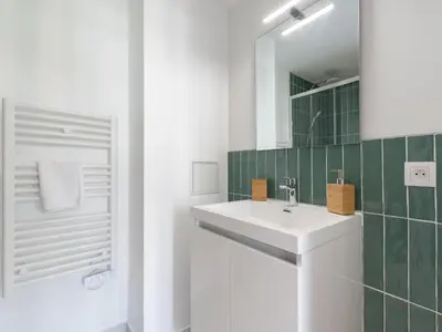 Salle de bains dans l'établissement Appartements Le Berliet - Montplaisir