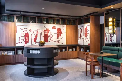 Coin salon dans l'établissement Hotel Le Lumière