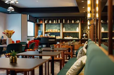 Coin salon dans l'établissement Hotel Le Lumière