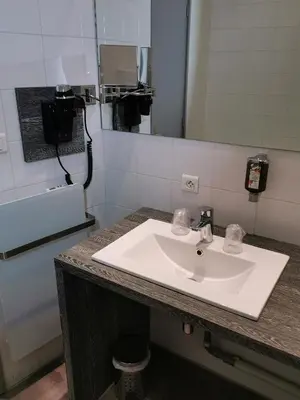 Cuisine ou kitchenette dans l'établissement Hotel de Paris