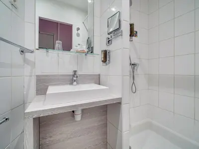 Salle de bains dans l'établissement Hotel de Paris