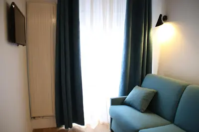 Télévision ou salle de divertissement dans l'établissement Hotel Saint Vincent