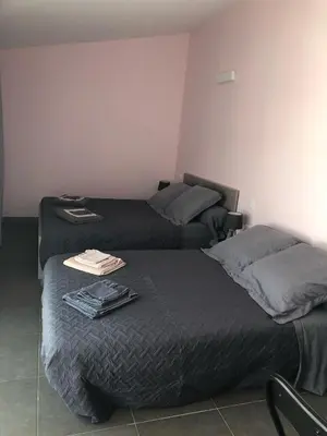 Un ou plusieurs lits dans un hébergement de l'établissement Chambres d'Hôtes Chez Florence