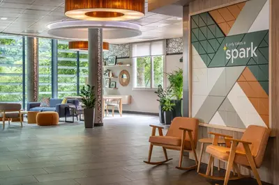 Coin salon dans l'établissement Spark by Hilton Lyon Ouest