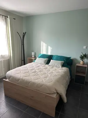 Un ou plusieurs lits dans un hébergement de l'établissement B&B Chez Jaika Chambre d hotes