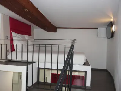 Un ou plusieurs lits dans un hébergement de l'établissement Le 12 Pierres - Croix-Rousse - Cosy & Design