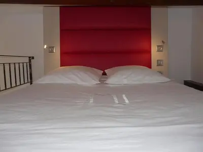 Un ou plusieurs lits dans un hébergement de l'établissement Le 12 Pierres - Croix-Rousse - Cosy & Design