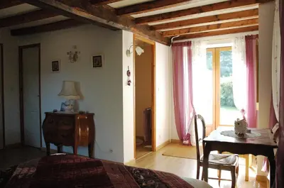 Coin salon dans l'établissement Chambres d'hôtes La Hulotte 69