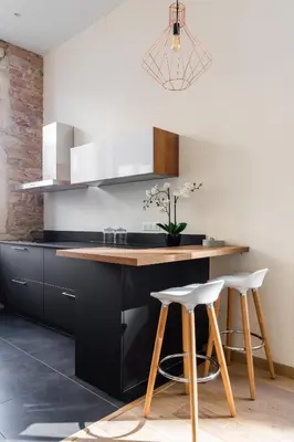 Cuisine ou kitchenette dans l'établissement DIFY Lumière - Masséna