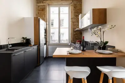 Cuisine ou kitchenette dans l'établissement DIFY Lumière - Masséna
