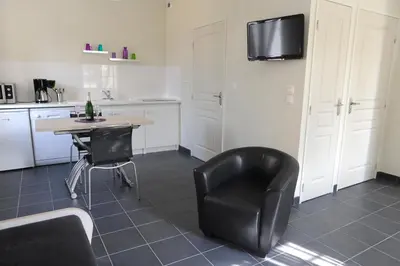 Cuisine ou kitchenette dans l'établissement Aux Jardins de L'Isle