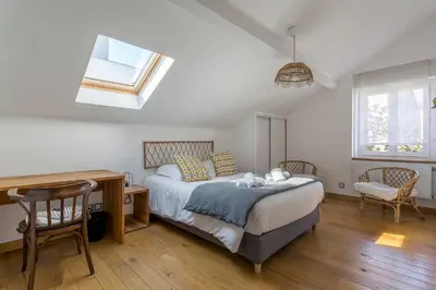 Un ou plusieurs lits dans un hébergement de l'établissement MAISON STELLA