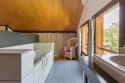 Un ou plusieurs lits dans un hébergement de l'établissement MAISON GAÏA