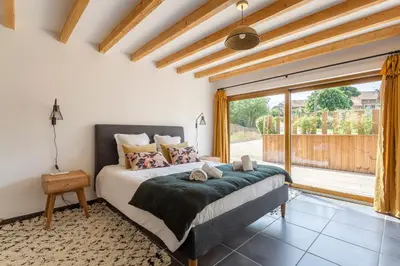 Un ou plusieurs lits dans un hébergement de l'établissement MAISON GAÏA