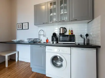 Cuisine ou kitchenette dans l'établissement Le Nid Lyonnais - Le Vienne