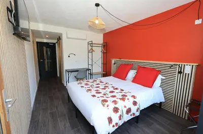 Un ou plusieurs lits dans un hébergement de l'établissement HOTEL RESTAURANT CIRIUS