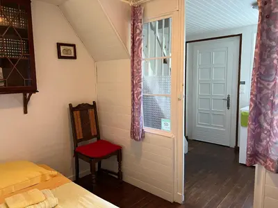 Un ou plusieurs lits dans un hébergement de l'établissement Maison d'Hôtes L'Escale Du Loup Blanc