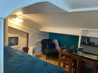 Coin salon dans l'établissement Maison d'Hôtes L'Escale Du Loup Blanc