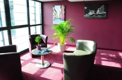 Coin salon dans l'établissement EastLodge Lyon Est Eurexpo