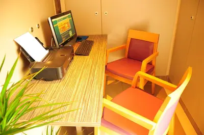 Télévision ou salle de divertissement dans l'établissement EastLodge Lyon Est Eurexpo