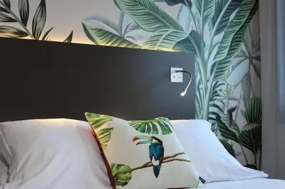 Un ou plusieurs lits dans un hébergement de l'établissement Best Western Plus Hôtel & Spa de Chassieu