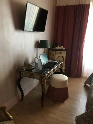 Télévision ou salle de divertissement dans l'établissement Villa Dufresne