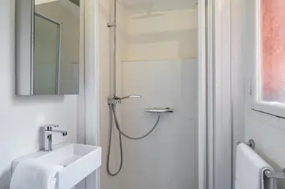 Salle de bains dans l'établissement Honorê - Suite Mercière