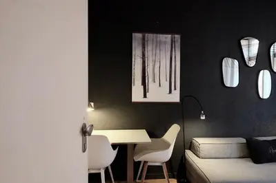 Coin salon dans l'établissement Honorê - Suite Mercière