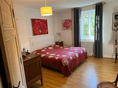 Un ou plusieurs lits dans un hébergement de l'établissement Chambres d'Hôtes Mado et Lulu