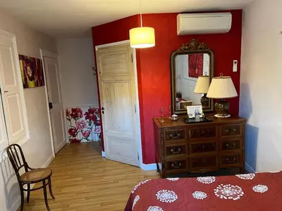 Un ou plusieurs lits dans un hébergement de l'établissement Chambres d'Hôtes Mado et Lulu