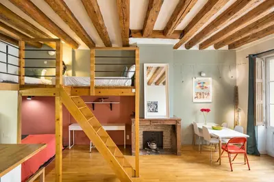 Un ou plusieurs lits dans un hébergement de l'établissement Honorê - Suites Amboise