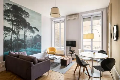 Coin salon dans l'établissement Honorê - Suite Barre