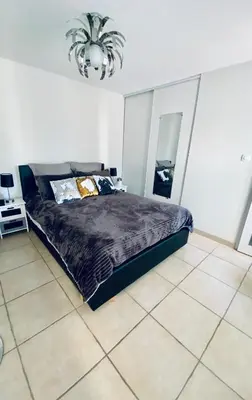 Un ou plusieurs lits dans un hébergement de l'établissement Maison d'hôtes chez Aud